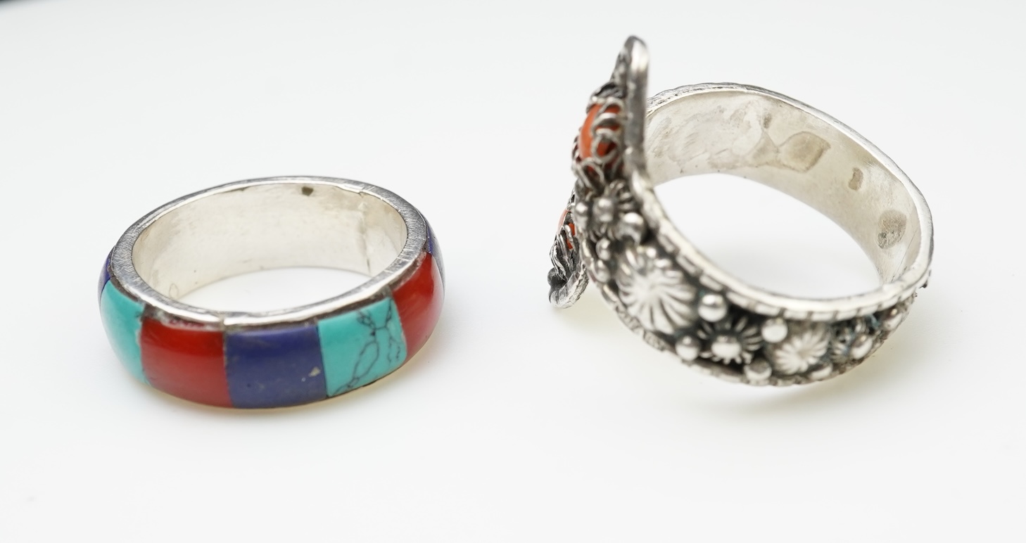 A collection of silver jewellery including a Zuni bangle